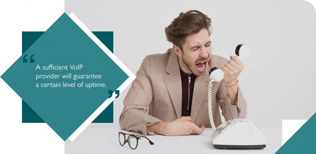 Frustrated employee shouting at unreliable VoIP phone