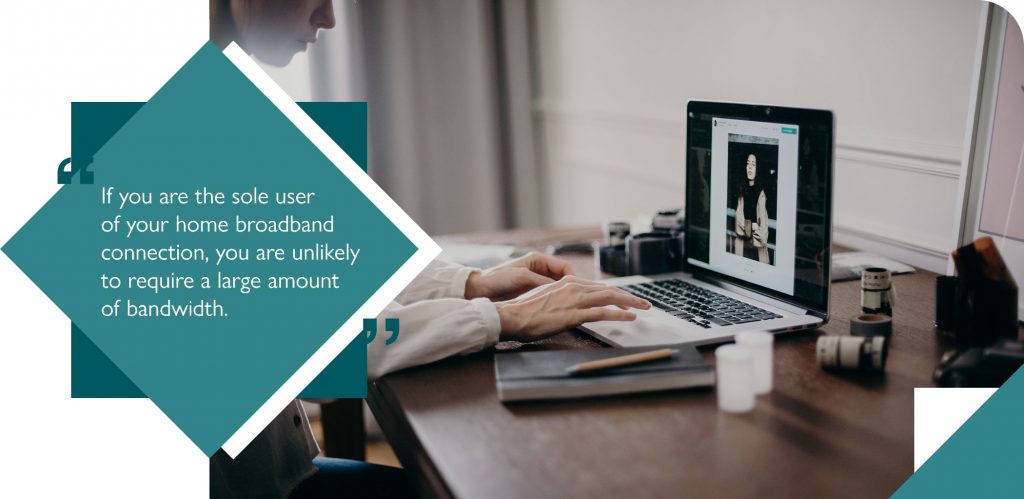 Employee at desk using broadband for working from home